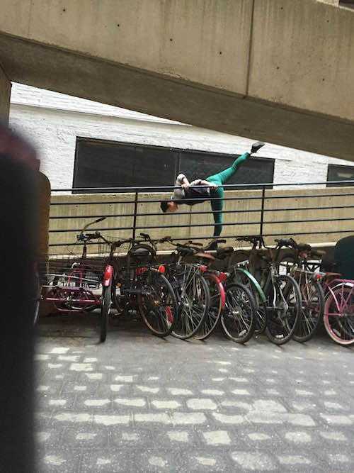 A dancer executes an arabesque penchee on a ramp